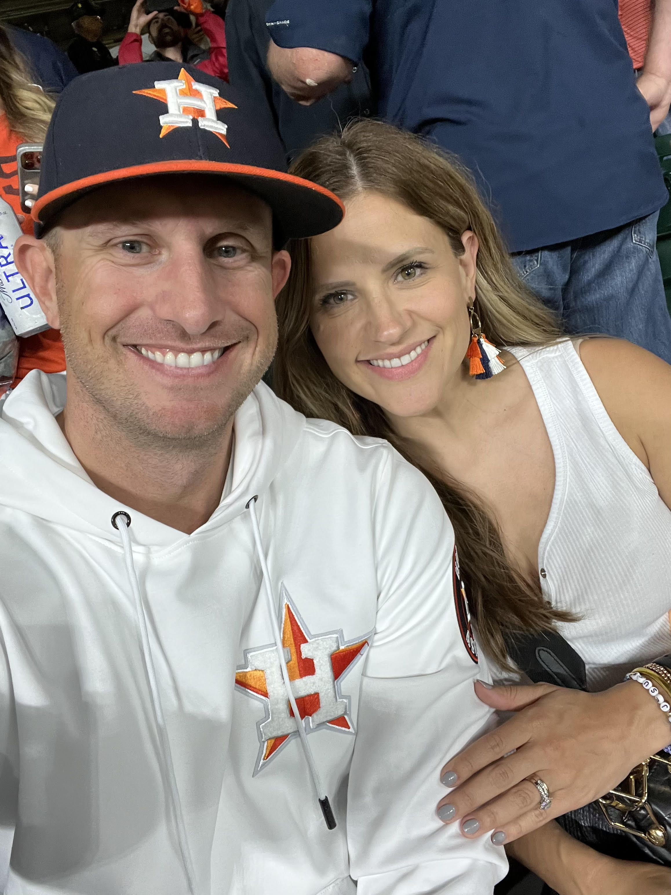 A smiling couple sharing a candid moment together.